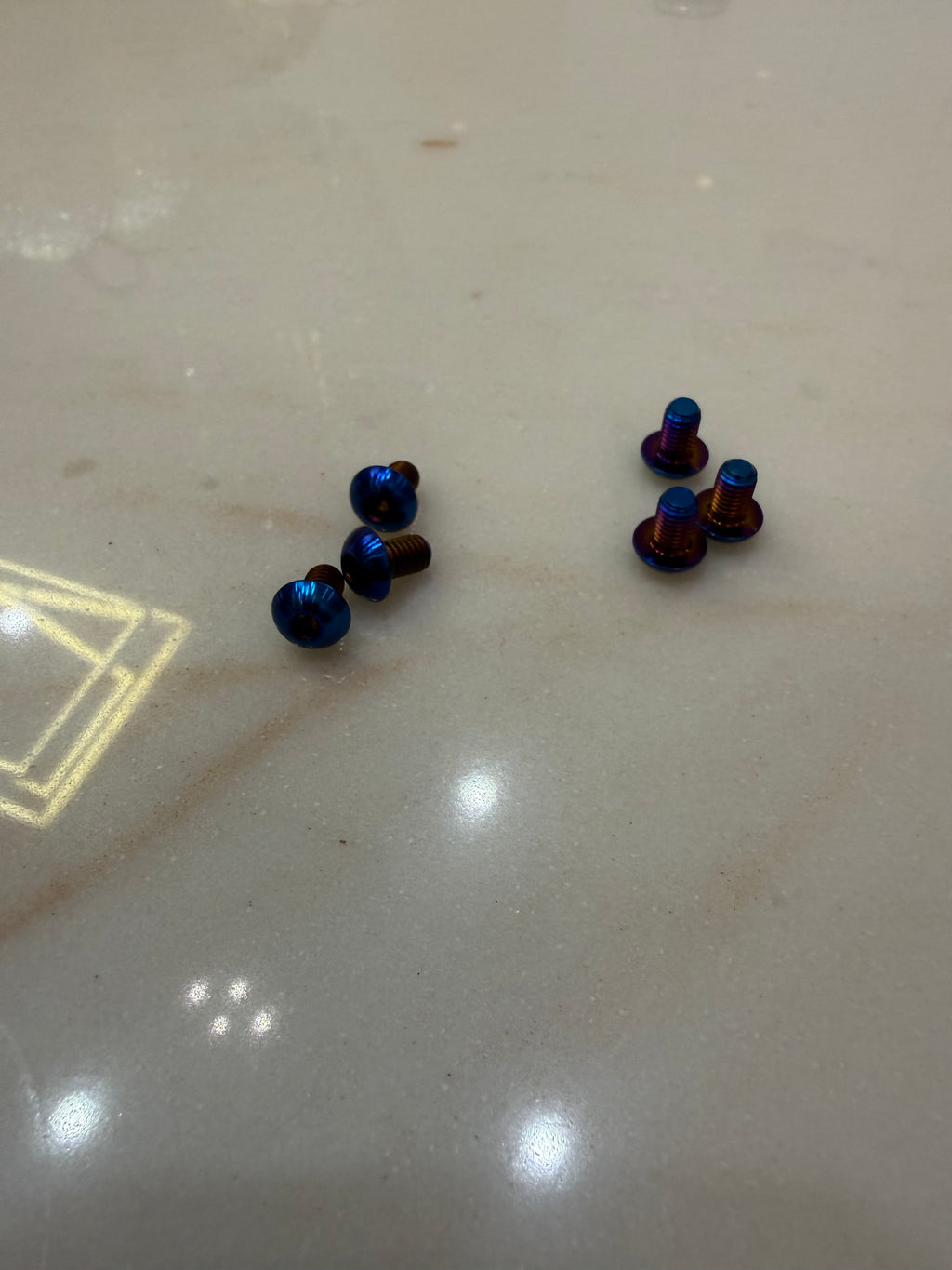 Titanium controller bolts