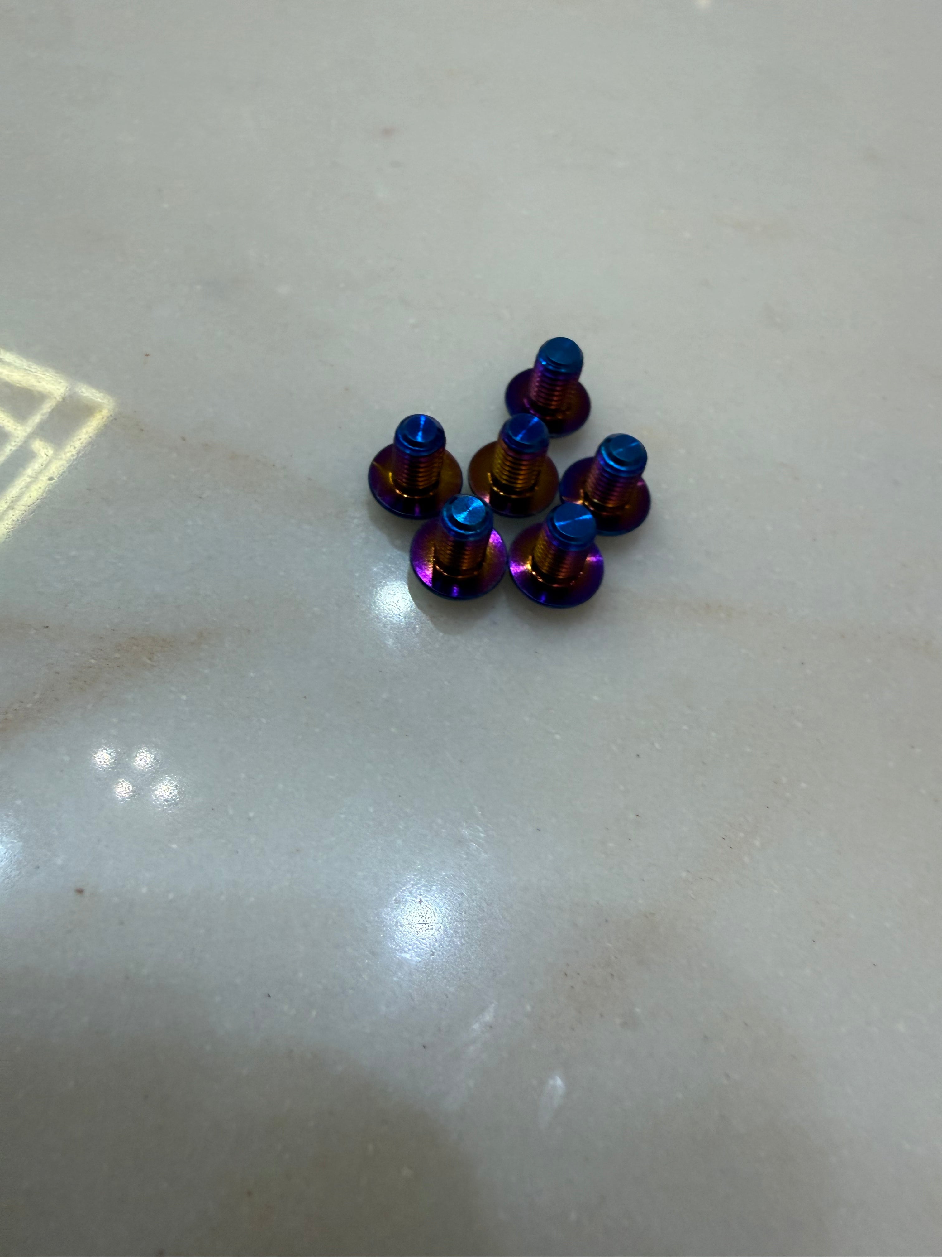 Titanium controller bolts